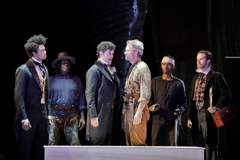 Davóne Tine (Ned Peters), Elliot Madore (Ramón), Ryan McKinny (Clarence), Chorus, Girls of the Golden West, John Adams. San Francisco Opera, 2017-18. Photographer: Cory Weaver/San Francisco Opera.