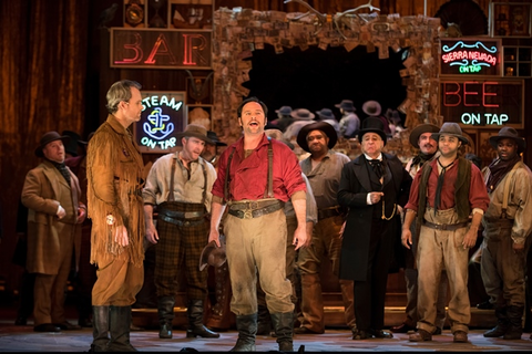 Ryan McKinny (Clarence), Paul Appleby (Joe Cannon), Chorus, Girls of the Golden West, John Adams. San Francisco Opera, 2017-18. Photographer: Stefan Cohen/San Francisco Opera.