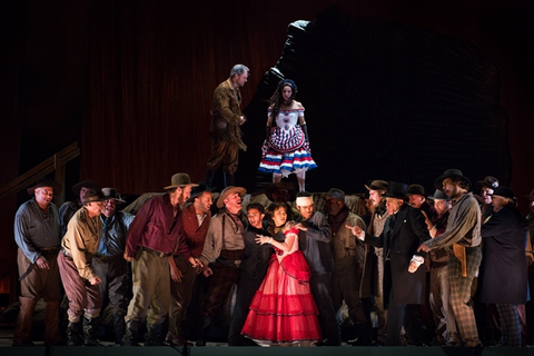 Ryan McKinny (Clarence), Lorena Feijóo (Lola Montez), Hye Jung Lee (Ah Sing), Chorus, Girls of the Golden West, John Adams. San Francisco Opera, 2017-18. Photographer: Stefan Cohen/San Francisco Opera.