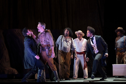 Elliot Madore (Ramón), Ryan McKinny (Clarence), Davóne Tines (Ned Peters), Chorus, Girls of the Golden West, John Adams. San Francisco Opera, 2017-18. Photographer: Stefan Cohen/San Francisco Opera.