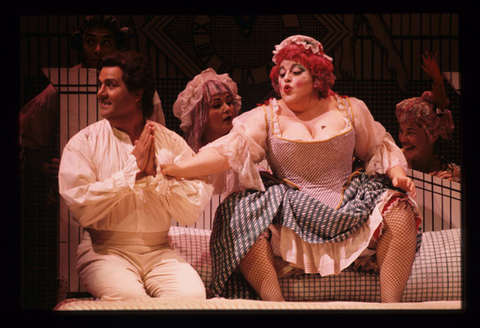 Raymond Very (Tom Rakewell), Susan Nicely (Mother Goose), Chorus, The Rake's Progress, Igor Stravinsky. San Francisco Opera, 1999-2000. Photographer: Ken Friedman/San Francisco Opera.