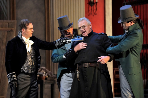 Scott Hendricks as Scarpia and Dale Travis as the Sacristan in Puccini's "Tosca." Photo: Cory Weaver/San Francisco Opera