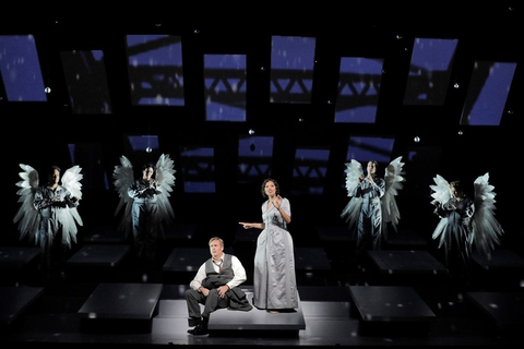 William Burden as George Bailey and Golda Schultz as Clara (center) with Amitai Pati, Ashley Dixon, Christian Pursell and Sarah Cambidge as Angels First Class in Jake Heggie and Gene Scheer's "It's a Wonderful Life."  Photo: Cory Weaver/San Francisco Opera