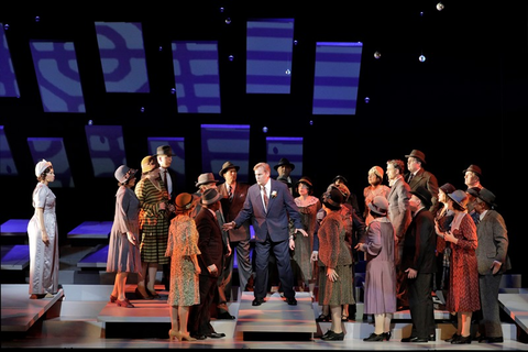 Golda Schultz as Clara (left) and William Burden as George Bailey with members of the San Francisco Opera Chorus in Jake Heggie and Gene Scheer's "It's a Wonderful Life."  Photo: Cory Weaver/San Francisco Opera