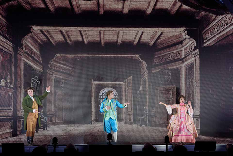 Lucas Meachem as Figaro, Alek Shrader as Count Almaviva, and Daniela Mack as Rosina in Rossini's "The Barber of Seville."  Photo: Stefan Cohen