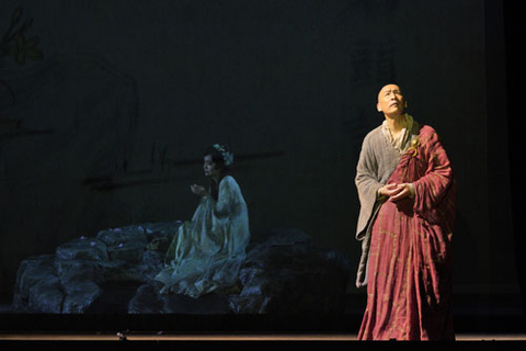 Francis Jue as the Monk (foreground) with Meigui Zhang as Dai Yu in Bright Sheng's "Dream of the Red Chamber." Photo: Cory Weaver/San Francisco Opera