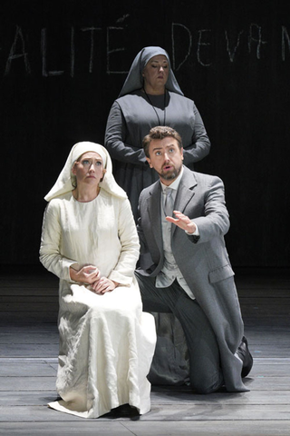 Heidi Stober as Blanche de la Force and Ben Bliss as Chevalier de la Force with Melody Moore as Mother Marie (standing) in Poulenc's "Dialogues of the Carmelites." Photo: Cory Weaver/San Francisco Opera