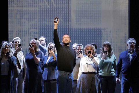 John Moore as Steve Jobs with members of the San Francisco Opera Chorus in Mason Bates and Mark Campbell's "The (R)evolution of Steve Jobs." Photo: Cory Weaver/San Francisco Opera