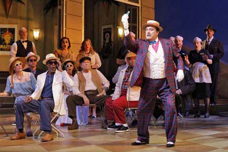 Renato Girolami as Dulcamara with members of the San Francisco Opera Chorus in Donizetti's "The Elixir of Love." Photo: Cory Weaver/San Francisco Opera