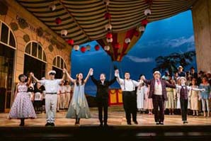 The cast of Donizetti's "The Elixir of Love" bows at the November 19 opening: Arianna Rodriguez (Giannetta), David Bizic (Belcore), Slávka Zámečníková (Adina), Ramón Tebar (conductor), Pene Pati (Nemorino), Renato Girolami (Dulcamara), Aidan Politza (Dulcama's Assistant). Photo: Kristen Loken/San Francisco Opera Keywords Elixir of Love San Francisco Opera