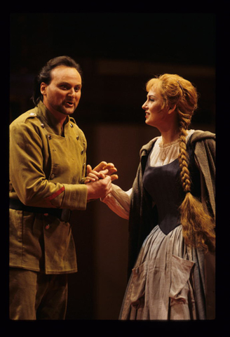 Walter Fraccaro (Don José), Andrea Dankova (Micaëla), Carmen, Georges Bizet. San Francisco Opera, 1997-98. Photographer: Marty Sohl/San Francisco Opera.