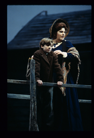 Thomas Buran (Boy), Deborah Riedel (Ellen Orford), Peter Grimes, Benjamin Britten. San Francisco Opera, 1998-99. Photographer: Marty Sohl/San Francisco Opera.