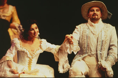 Anna Netrebko (Louisa), Evgeny Akimov (Don Antonio), Betrothal in a Monastery, Sergei Prokofiev. San Francisco Opera, 1998-99. Photographer: Ken Friedman/San Francisco Opera.