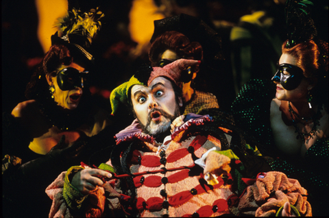 Paolo Gavanelli (Rigoletto), Chorus, Rigoletto, Giuseppe Verdi. San Francisco Opera, 1997-98. Photographer: Ron Scherl/San Francisco Opera.