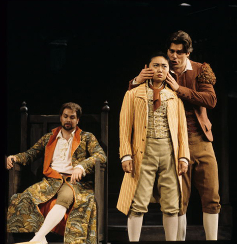 David Okerlund (Count Almaviva), Zheng Cao (Cherubino), John Relyea (Figaro), Le Nozze di Figaro, Wolfgang Amadeus Mozart. San Francisco Opera, 1997-98. Photographer: Marty Sohl/San Francisco Opera.