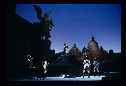 Georgina Lukacs (Tosca), Mario Malagnini (Mario Cavaradossi), Supernumeraries, Tosca, Giacomo Puccini. San Francisco Opera, 1997-98. Photographer: Marty Sohl/San Francisco Opera.