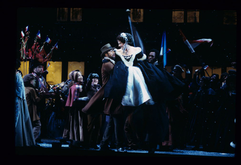 David Okerlund (Schaunard), Nicolle Foland (Musetta), Chester Patton (Colline), Ensemble, La Bohème, Giacomo Puccini. San Francisco Opera, 1995-96. Photographer: Marty Sohl/San Francisco Opera.