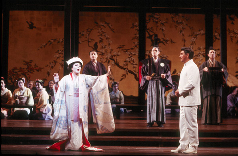 Miriam Gauci (Cio-Cio-San), Zoran Todorovich (Pinkerton), Chorus, Madama Butterfly, Giacomo Puccini. San Francisco Opera, 2001-02. Photographer: Ken Friedman/San Francisco Opera.