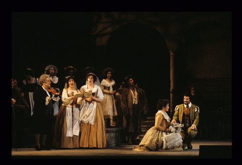 Michel Sénéchal (Don Basilio), Simone Alaimo (Figaro), Cheryl Parrish (Susanna), Chorus, Le Nozze di Figaro, Wolfgang Amadeus Mozart. San Francisco Opera, 1990-91. Photographer: Larry Merkle/San Francisco Opera.