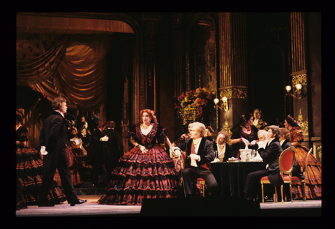 Catherine Keen (Flora Bervoix), Chorus, La Traviata, Giuseppe Verdi. San Francisco Opera, 1991-92. Photographer: Marty Sohl/San Francisco Opera.