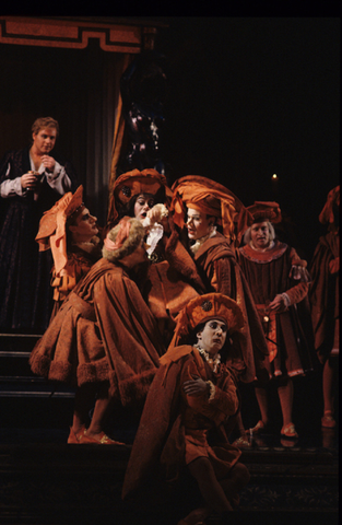 Richard Leech (The Duke of Mantua), Chorus, Rigoletto, Giuseppe Verdi. San Francisco Opera, 1990-91. Photographer: Marty Sohl/San Francisco Opera.