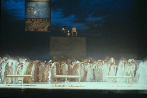 Douglas Perry (Gandhi), Chorus, Satyagraha, Philip Glass. San Francisco Opera, 1989-90. Photographer: Ron Scherl/San Francisco Opera.