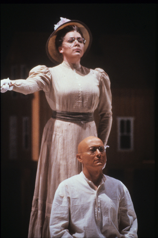 Emily Manhart (Mrs. Alexander), Douglas Perry (Gandhi), Satyagraha, Philip Glass. San Francisco Opera, 1989-90. Photographer: Ron Scherl/San Francisco Opera.