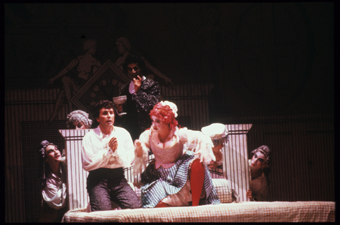 Jerry Hadley (Tom Rakewell), Judith Christin (Mother Goose), Ensemble, The Rake's Progress, Igor Stravinsky. San Francisco Opera, 1988-89. Photographer: Ron Scherl/San Francisco Opera.