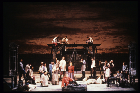 Josephine Barstow (Katerina Ismailova), Jacque Trussel (Sergei), Chorus, Lady Macbeth of Mtsensk, Dmitri Shostakovich. San Francisco Opera, 1988-89. Photographer: Ron Scherl/San Francisco Opera.