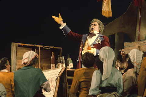 Paolo Montarsolo (Dulcamara), Chorus, L'Elisir d'Amore, Gaetano Donizetti. San Francisco Opera, 1975. Photographer: Greg Peterson/San Francisco Opera.