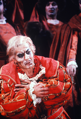 Garbis Boyagian (Rigoletto), Chorus, Rigoletto, Giuseppe Verdi. San Francisco Opera, 1980-81. Photographer: Ron Scherl/San Francisco Opera.