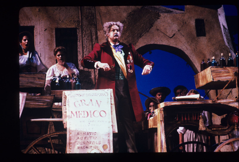 John Del Carlo (Dr. Dulcamara), Chorus, L'Elisir d'Amore, Gaetano Donizetti. San Francisco Opera, 1984-85. Photographer: Ron Scherl/San Francisco Opera.