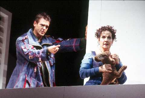 Nathan Gunn (Figaro), Helene Schneiderman (Rosina), Il Barbiere di Siviglia, Gioachino Rossini. San Francisco Opera, 2003-04. Photographer: Ken Friedman/San Francisco Opera.